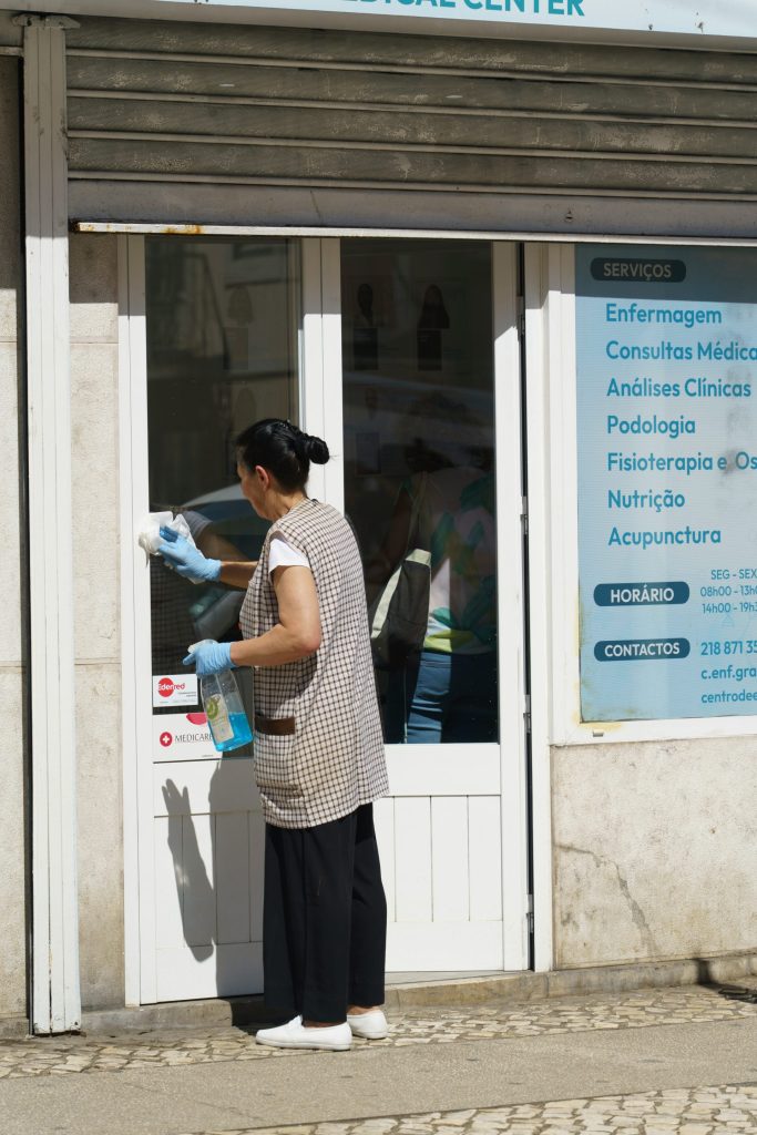 A man standing outside of a medical center